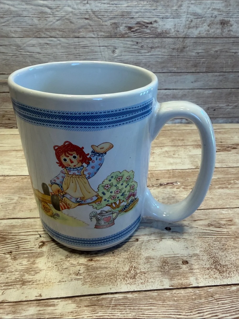 Vintage Raggedy Ann and Andy Ceramic Coffee Mug with Cartoon Illustration